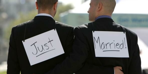 81601297-same-sex-couple-ariel-owens-and-his-spouse-joseph-barham.jpg.CROP.promo-mediumlarge